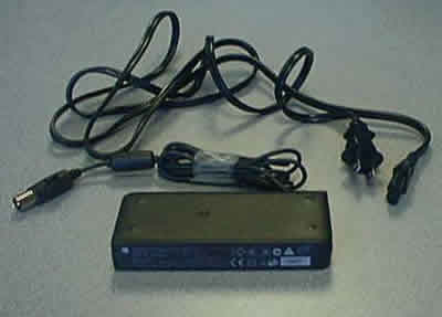 Picture of PowerBook and Recalled Adapter